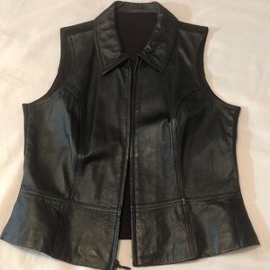 Wilson black leather vest features a zip front and collar.